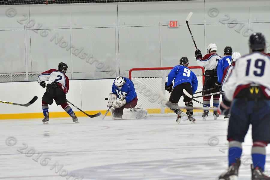 Wheaton College Men\'s Ice Hockey vs Middlesex Community College. - Photo By: KEITH NORDSTROM
